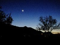 Earthglow moon at sunset